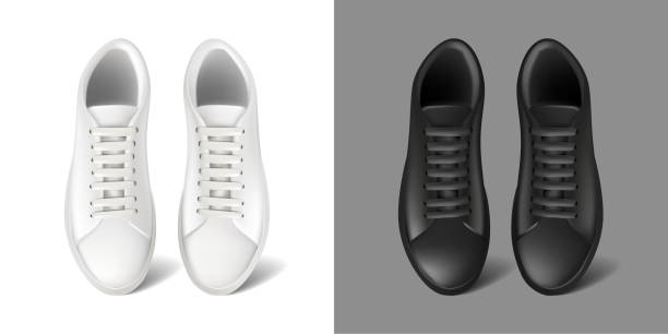 istock realistic vector icon. Set of running sneakers shoes in white and black color. Side view. 1440663066