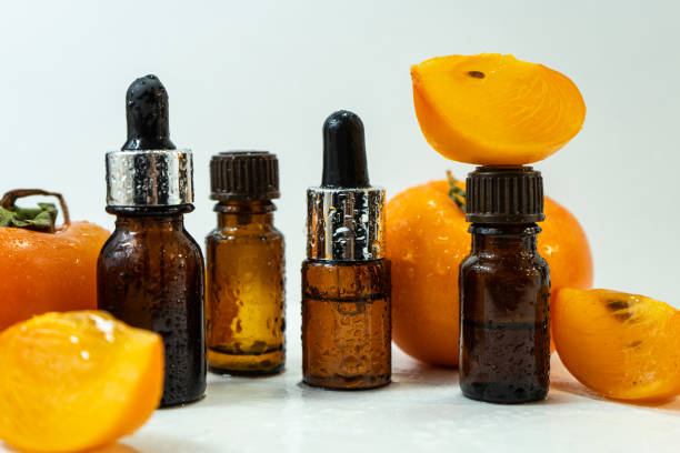 istock Persimmon fruit oil on a white background. 1440666353