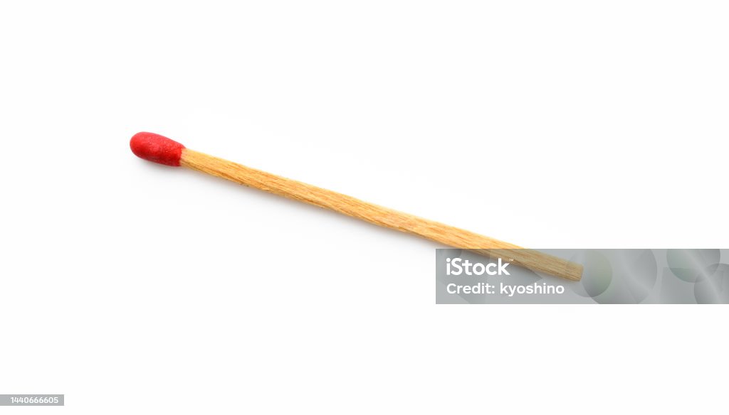 Isolated shot of old match stick on white background Overhead shot of old match stick, isolated on white with clipping path. Match - Lighting Equipment Stock Photo