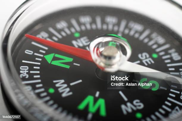 Closeup Compass Stock Photo - Download Image Now - Direction, Navigational Compass, Navigational Equipment