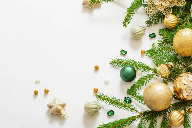 istock golden and green  christmas decorations  on white  background 1440672135