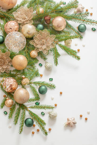 istock golden and green  christmas decorations  on white  background 1440672139