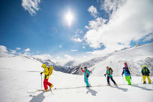 Group of people going back country skiing