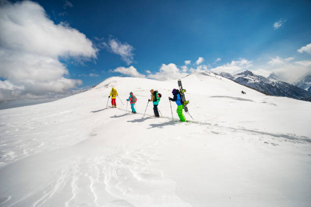 istock Group of people going back country skiing 1440678536