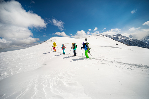 Group of people going back country skiing