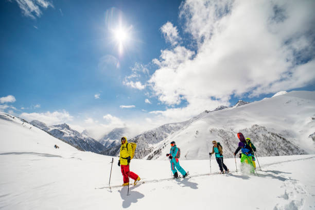 istock Group of people going back country skiing 1440678543
