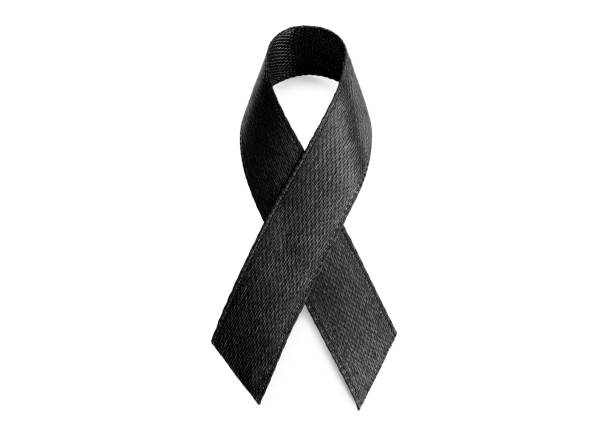 Black ribbon isolated on white. World Cancer Day
