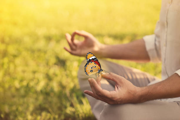 istock Man meditating outdoors on sunny day, closeup. Space for text 1440679825