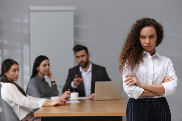 istock African American woman suffering from racial discrimination at work 1440680342