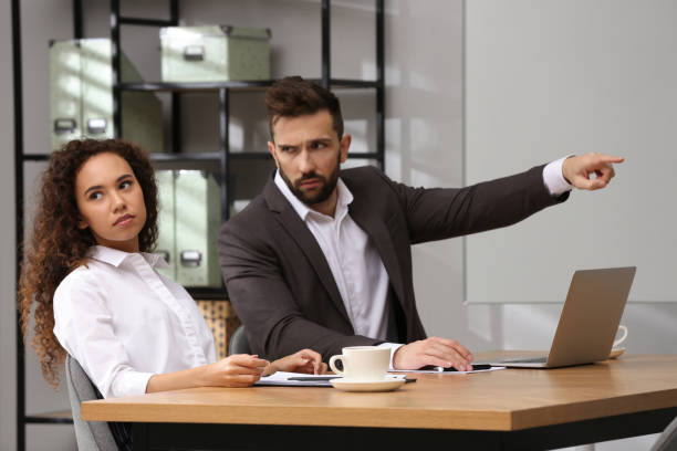 istock African American woman suffering from racial discrimination at work 1440680441
