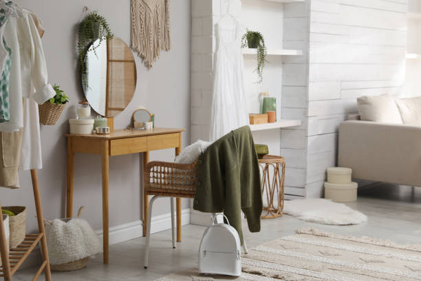 istock Wooden dressing table with decorative elements in room. Interior design 1440681047