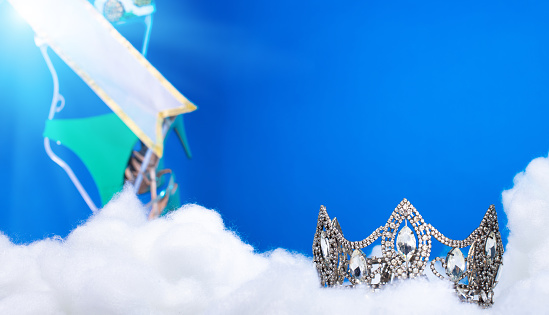 Puff Cloud Diamond Crown put on cloudscape Deep blue sky atmosphere high heaven for Miss Beauty Pageant Contest Competition, bikini sash high heel shoes hang on outing trip camping background