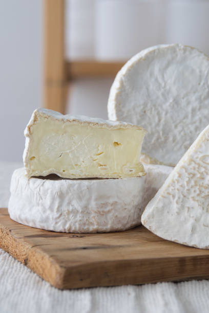 istock Different geometric forms of camamber cheese. Multiform cheese camamber brie composition. Selective focus 1440681689