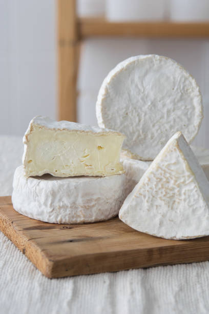 istock Different geometric forms of camamber cheese. Multiform cheese camamber brie composition. Selective focus 1440681694