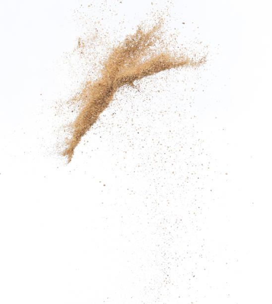 istock Sand flying explosion, Golden sand wave explode. Abstract sands cloud fly. Yellow colored sand splash throwing in Air. White background Isolated high speed shutter, throwing freeze stop motion 1440681802