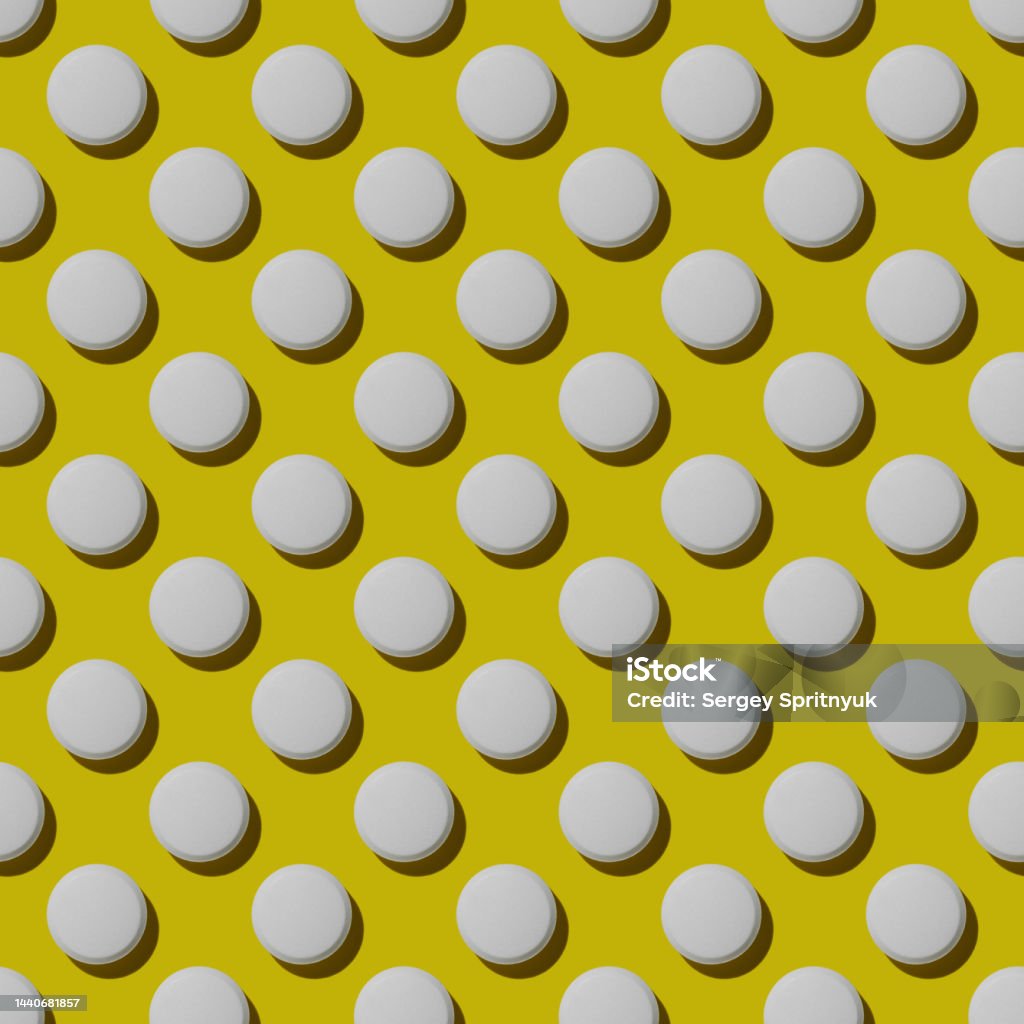 Modern pattern with hard shadows of white pills on yellow background. Food supplement, multivitamins, medications Probiotic Stock Photo