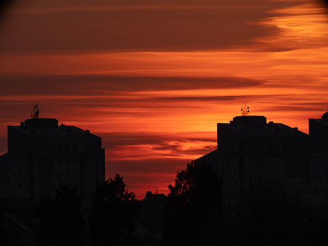 Breathtaking sunset view over cityscape. Copy space.