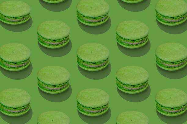 istock Isometric composition from traditional french macarons on green. 1440685392