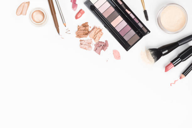 istock Decorative cosmetics on white background top view with copy space 1440686159