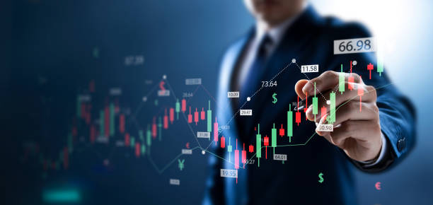businessman hand touch graph interface Buying shares in the stock market Financial data analysis, timely acquisition, stock acquisition ideas of companies with growing businesses in the future. stock photo