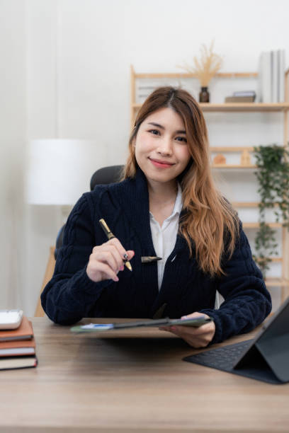istock Asian woman working with laptop at home. work from home concept 1440689292
