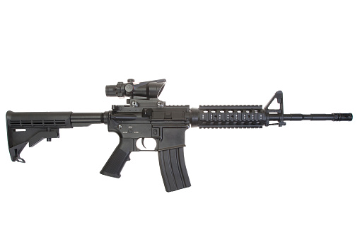 US Army carbine with optical sight isolated on a white background