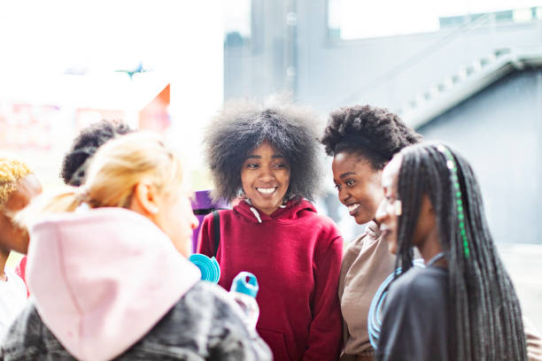 istock Young Black and White women talking outdoors after sport training at overcast 1440690947