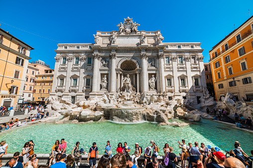 Rome, Italy - June 30, 2019: Trevi Fountain (Fontana di Trevi) in Rome, Italy. The Trevi Fountain is the largest Baroque fountain in Rome.