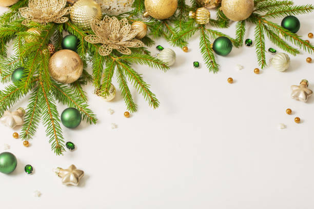 istock golden and green  christmas decorations  on white  background 1440697605