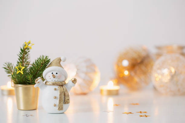 istock Christmas decorations with little ceramic snowman 1440697615