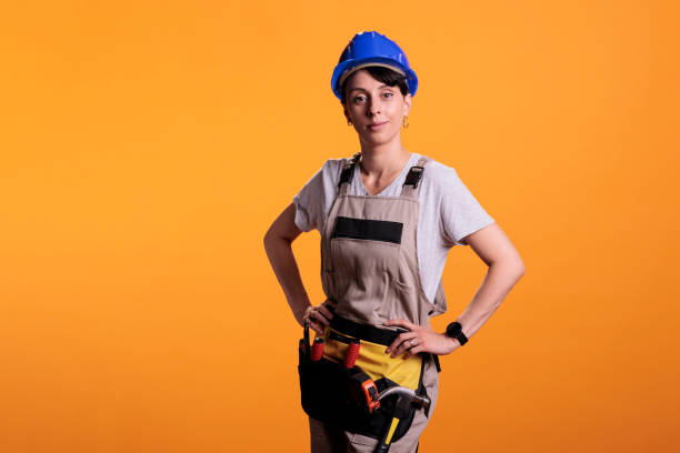 istock Portrait of woman dressed as construction worker 1440698443