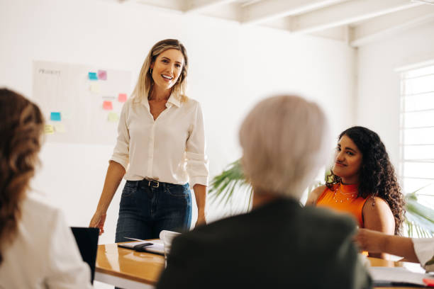 istock Businessswomen having a meeting in a creative office 1440699820