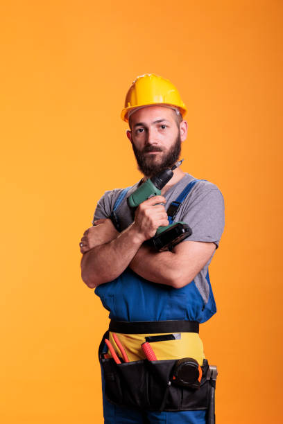istock Engineering repairman holding cordless electric drill 1440700558