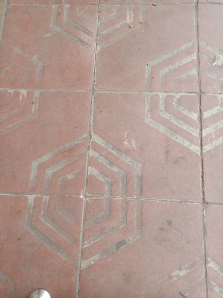 istock Dull and slightly textured red pedestrian floor 1440701115