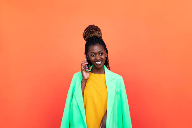 istock Young Black woman using phone 1440704889
