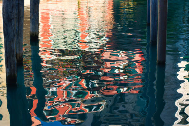 istock Impressionist reflection on building in the water of Venice 1440712847