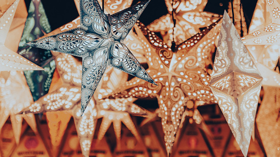 Christmas home decor - Decorated star lanterns in Christmas market stall