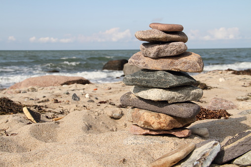 A pile of zen rocks on a pebble beach in Sussex