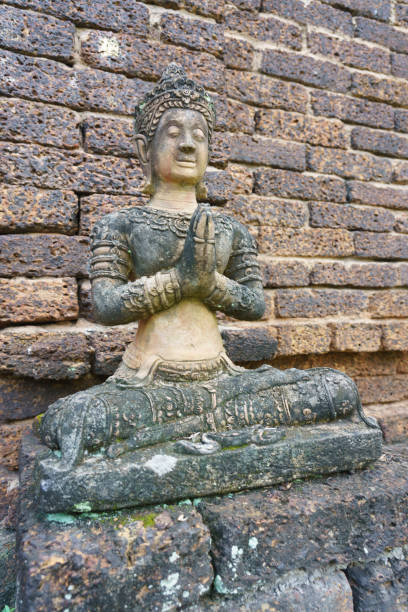 istock Wat Jed Yod, built in 1497, is a large active temple where monks live and study, and is seldom visited by foreigners. It is one of the ancient temples and translates to Seven Peaks Temple 1440717349
