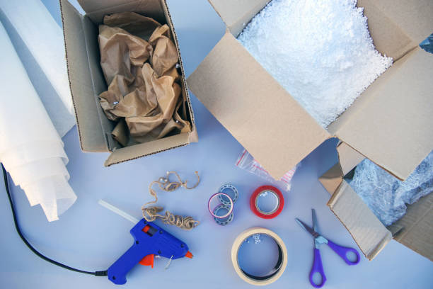 istock Different packaging for parcels. The concept of protecting fragile goods. 1440718345
