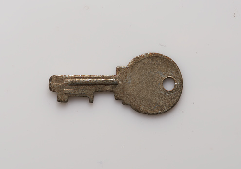 Old rusty door key. Antique Metal key