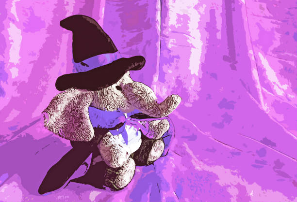 Adorable baby elephant doll in wizard costume on purple backdrop