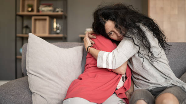 istock Women supporting sad friend trying to solve a problem. 1440724193