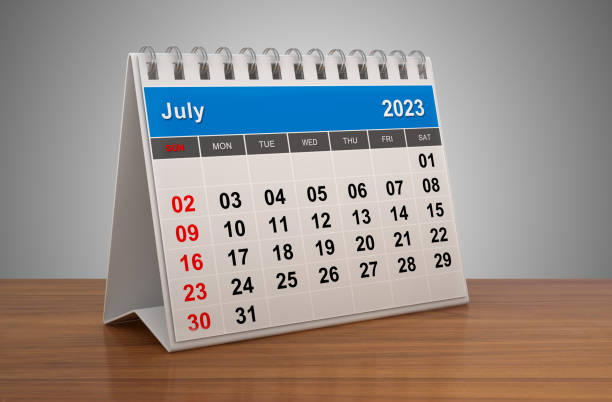 2023 july calendar on desk stock photo