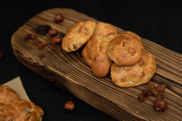 istock Biscuits with raisins and nuts on a wooden background 1440729439