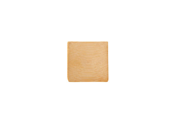 istock Square small serving wooden plate for small snacks from the chef. Empty plate for amuse-bouche or amuse-gueule isolated on white background. Design element 1440729833