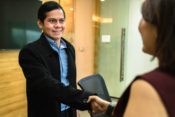 istock Financial advisor meeting with prospective customer 1440731451