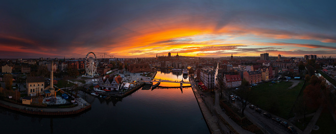 Panorama of Gdansk city over the Motlawa river at sunset. Poland