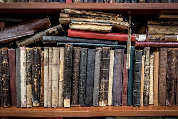 istock Old books on wooden shelf 1440734260