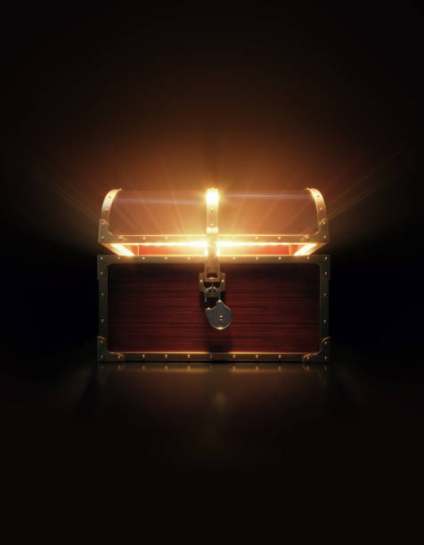 istock Glowing Wooden Treasure Chest On Black Background 1440736011